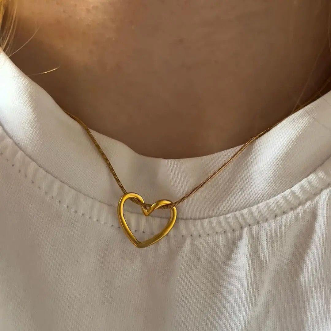 Minimal heart-shaped gold necklace with open loop design, anti-tarnish finish for daily or special wear