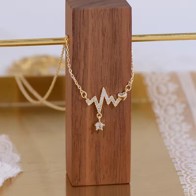 Hypoallergenic heartbeat necklace in minimalist gold style, crafted for comfort and perfect as a thoughtful gift