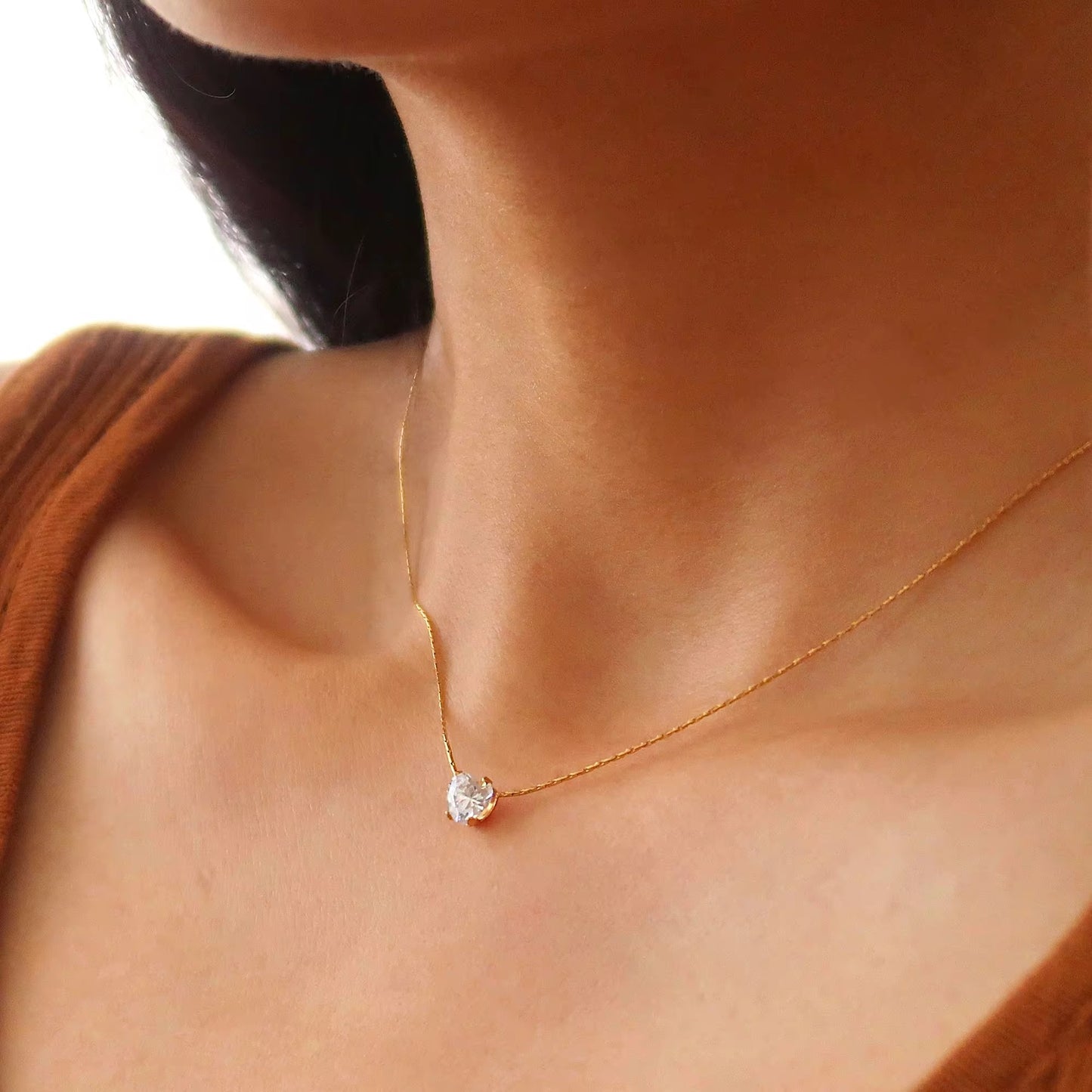 Minimal heart-shaped crystal necklace with gold plating, perfect for gifting or everyday use