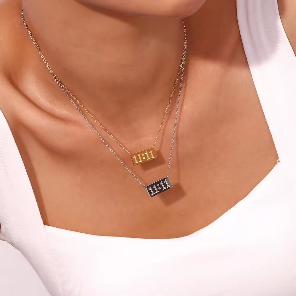 Bold 11:11 number pendant necklace in gold plating, perfect for everyday styling or positive energy lovers