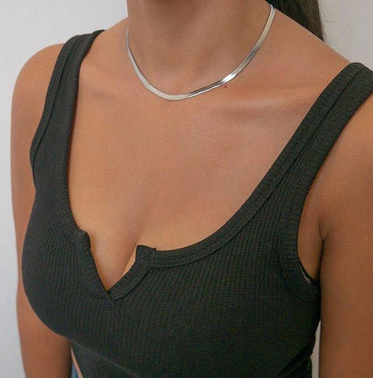 Gold-plated flat snake chain necklace in stainless steel, perfect for minimal and Pinterest-inspired outfits