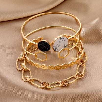 Chic & Cheeky: 4-Piece Gold Bracelet Set