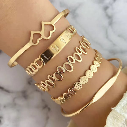 The Ultimate Golden Bangle Stack