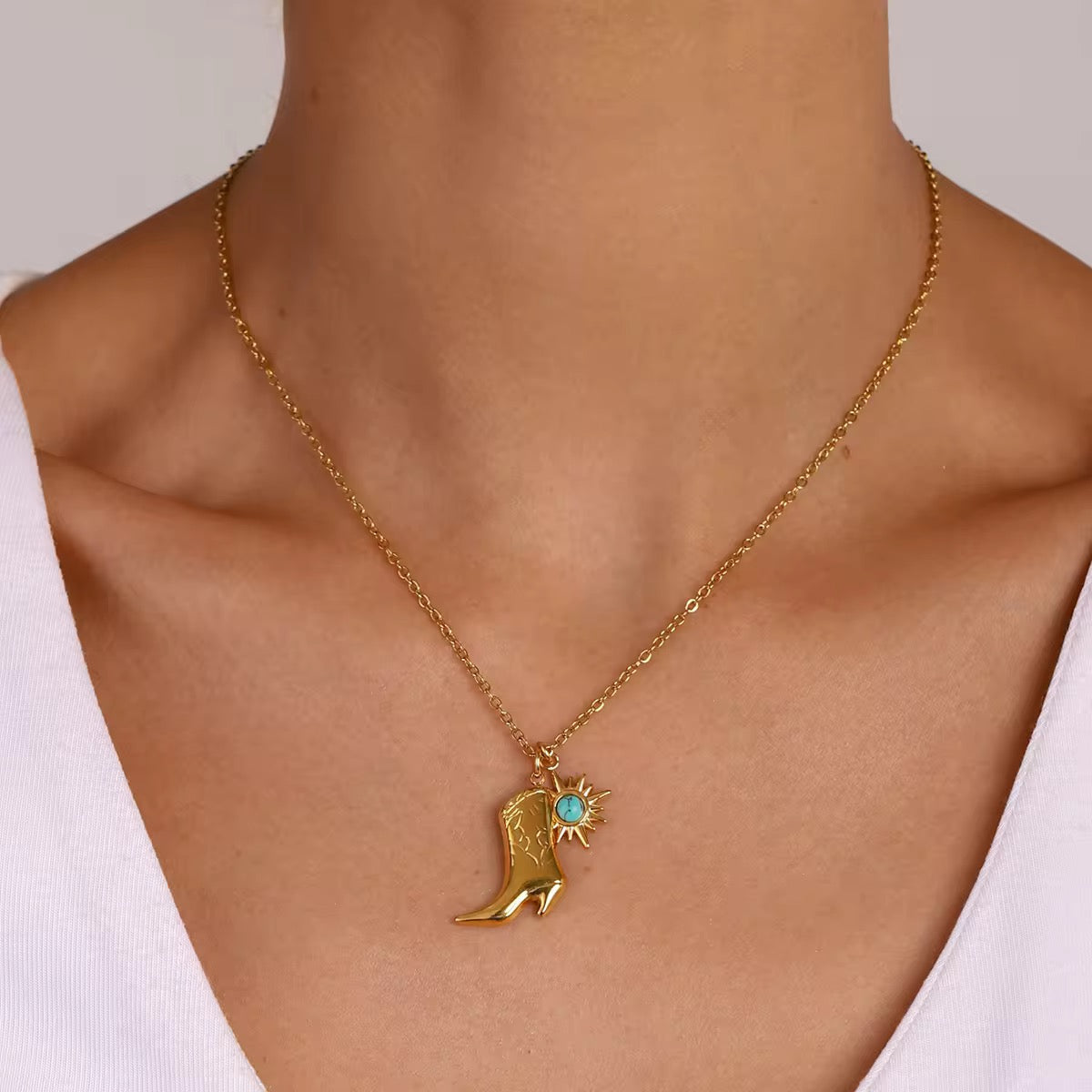 Western-style boot necklace with pop of turquoise, anti-tarnish and ideal for layering or solo wear