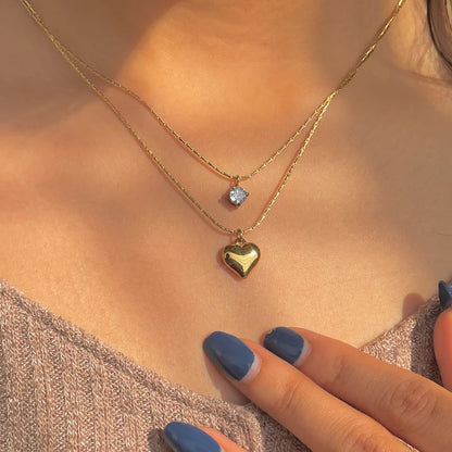 Layered gold heart necklace with diamond detail in stainless steel, perfect for gifting or wear under 450