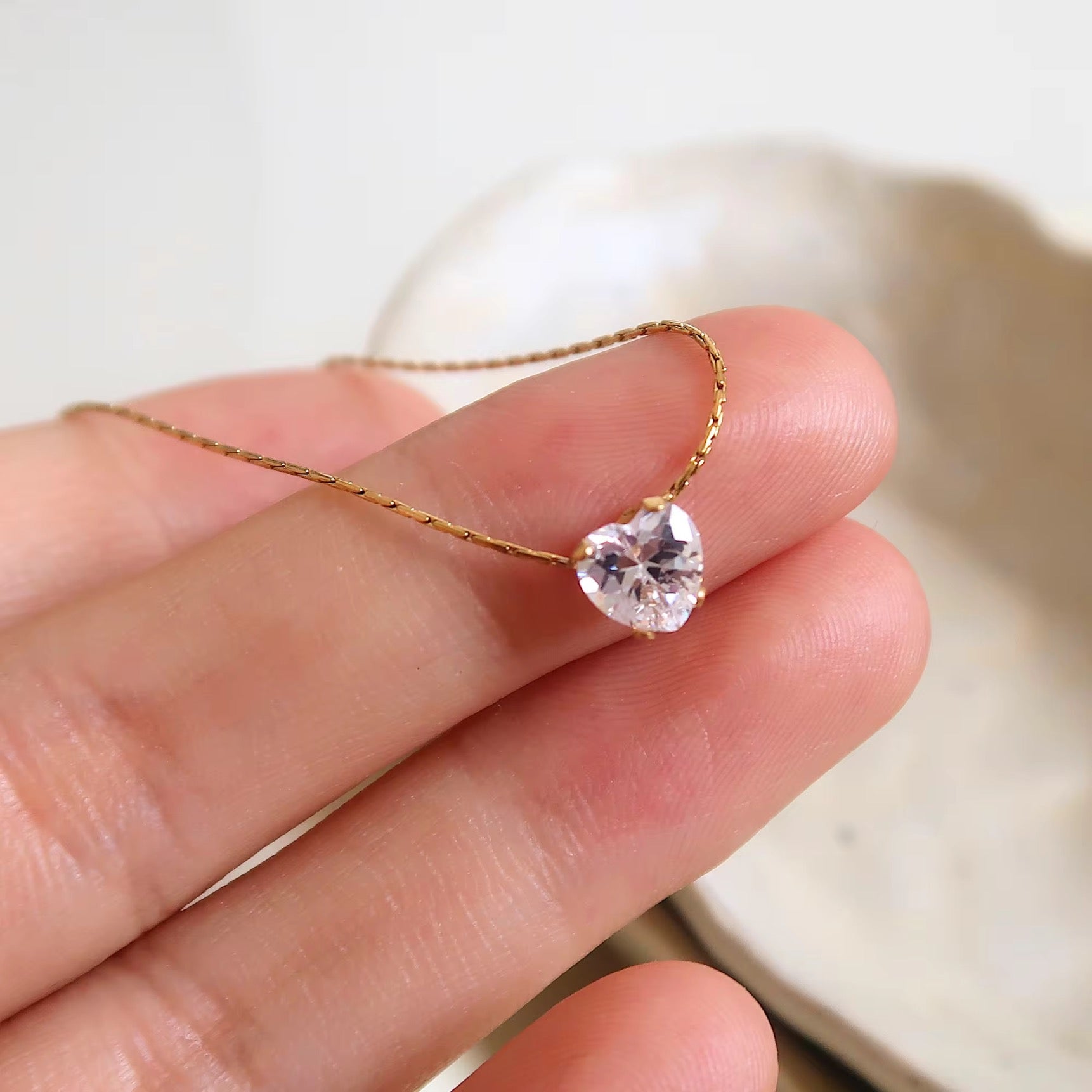 Heart-cut solitaire necklace with gold chain, dainty and anti-tarnish for daily wear or minimal styling

