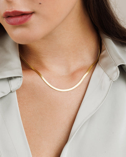 Sleek flat snake chain necklace in gold, rose gold, silver tones for layering and casual wear