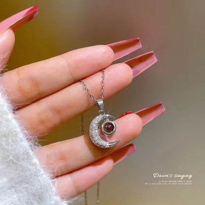 Crescent moon necklace with shimmering zircon in durable stainless steel for daily or date wear